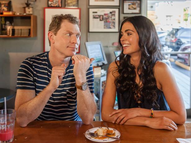 Guest Bobby Flay and Host Katie Lee give their impressions after tasting the cuban dessert "Flan" at Tinta y Cafe, as seen on Cooking Channel's Beach Bites with Katie Lee, Season 1.