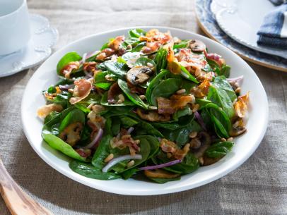 Beauty photo of Warm Spinach Salad with Pancetta Dressing during Family Favorites, as seen on Cooking Channel's Dinner at Tiffani's, Season 2.