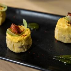 At MilkWood, Rutledge and Damaris dig into Southern standards shot through with Asian-tinged flavors, The Shumai “Deviled Egg” is a creamy yolk filling nestled in an unexpected vessel: a delicate wrapper made from egg whites.