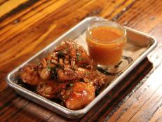 <p>Get your Southern fare fix at Treylor Park, with a few surprising twists like their PB&amp;J Wings, Shrimp and Grits Tacos and a chef's choice charcuterie board.</p>