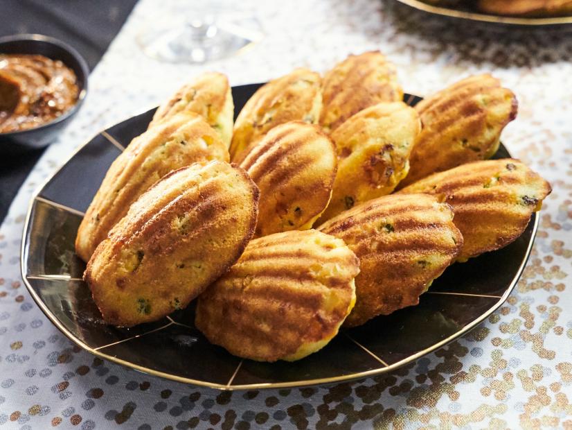 Host Tia Mowry's dish, Cornbread Madeleines, as seen on Cooking Channel’s Tia Mowry At Home, Season 3.