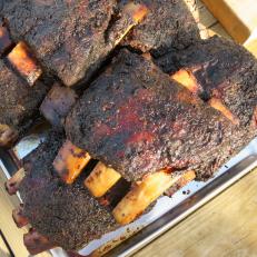 This pile of delicious smoked beef ribs made by Executive Chef, Anthony Endy can be found at The Alisal Guest Ranch & Resort in Solvang, California, as seen on Cooking Channel's Man Fire Food, Season 7.