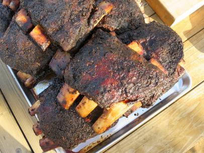 This pile of delicious smoked beef ribs made by Executive Chef, Anthony Endy can be found at The Alisal Guest Ranch & Resort in Solvang, California, as seen on Cooking Channel's Man Fire Food, Season 7.