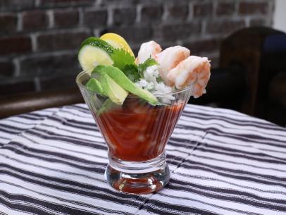 Shrimp cocktail made fresh with a base of ketchup, but with a special addition - orange soda. Topped with fresh fruit and locally sourced shrimp, as seen on Charleston Chow, Season 1.