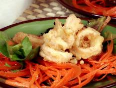 Cooking Channel serves up this Crispy Salt and Pepper Squid with Spicy Asian Salad recipe from Ching-He Huang plus many other recipes at CookingChannelTV.com